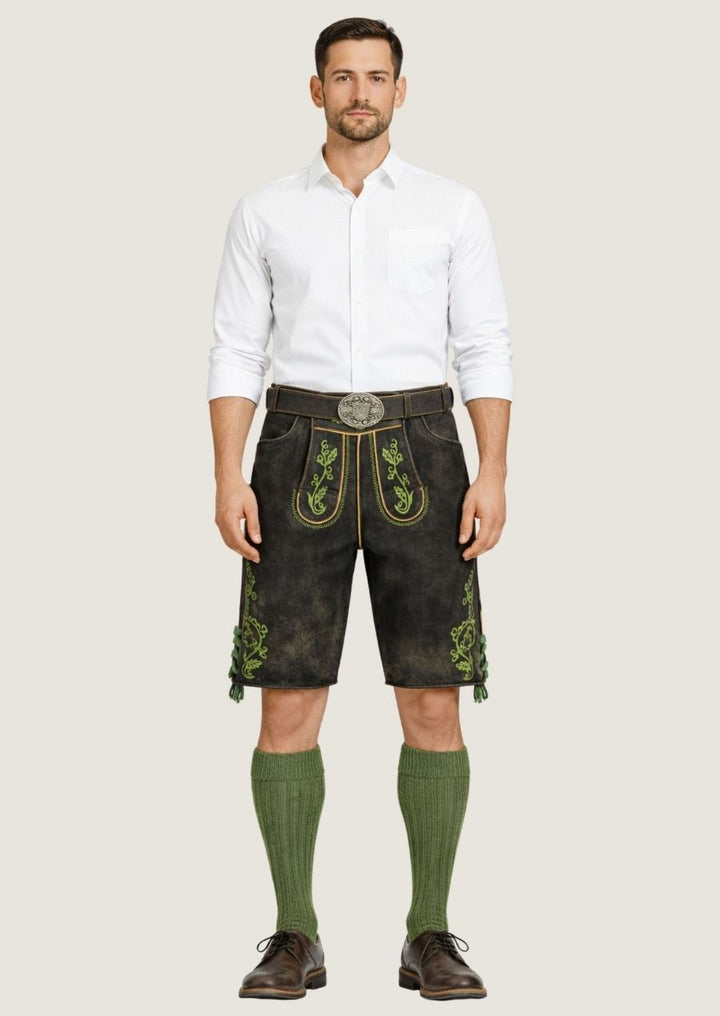 Schwarze Trachtenlederhose im Vintage-Look mit grüner Stickerei und rustikaler Optik