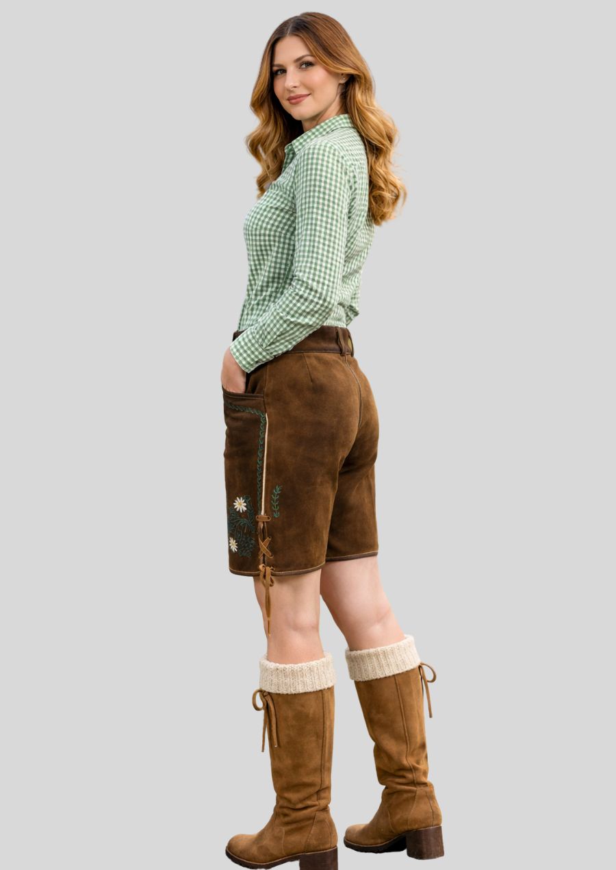 Seitenansicht einer braunen Damen Lederhose mit Blumen Stickerei